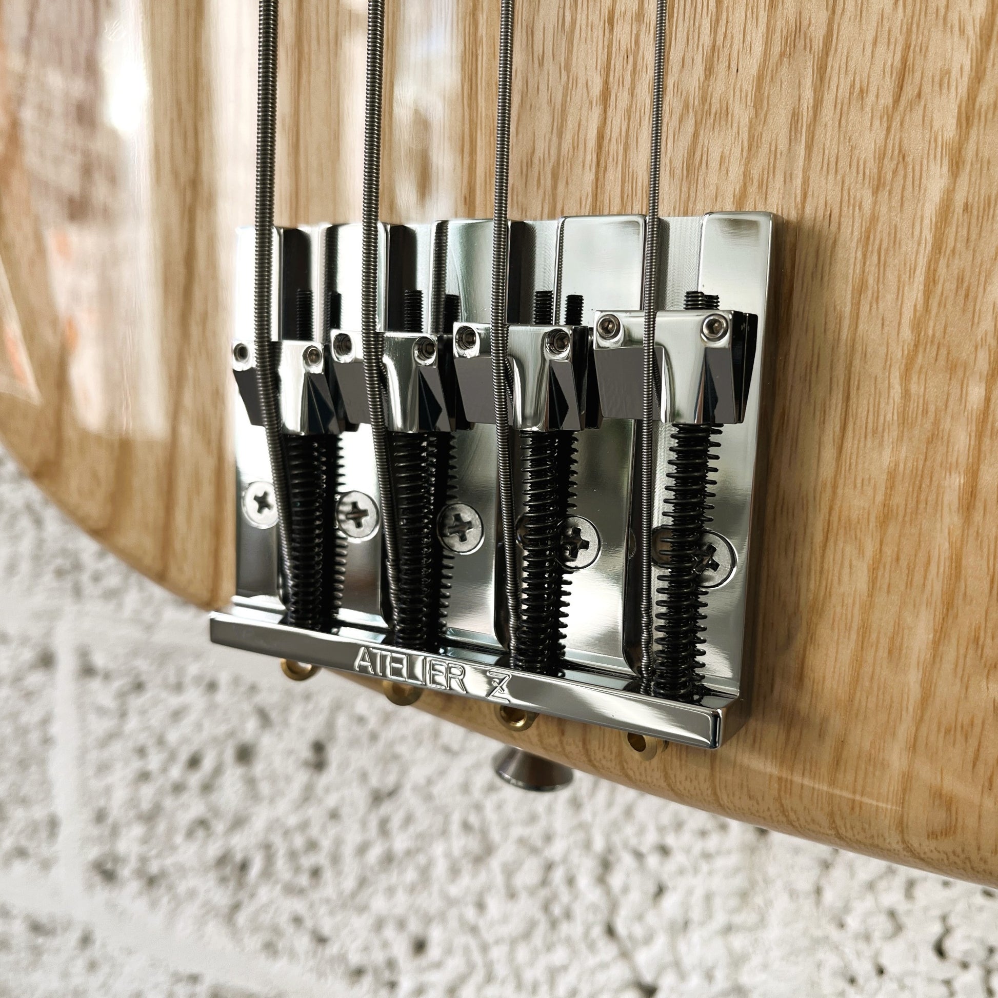atelier z m245 natural hand-built japanese 4-string active bass bridge