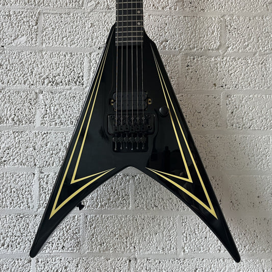 spira v420 flying v black yellow electric guitar body closeup